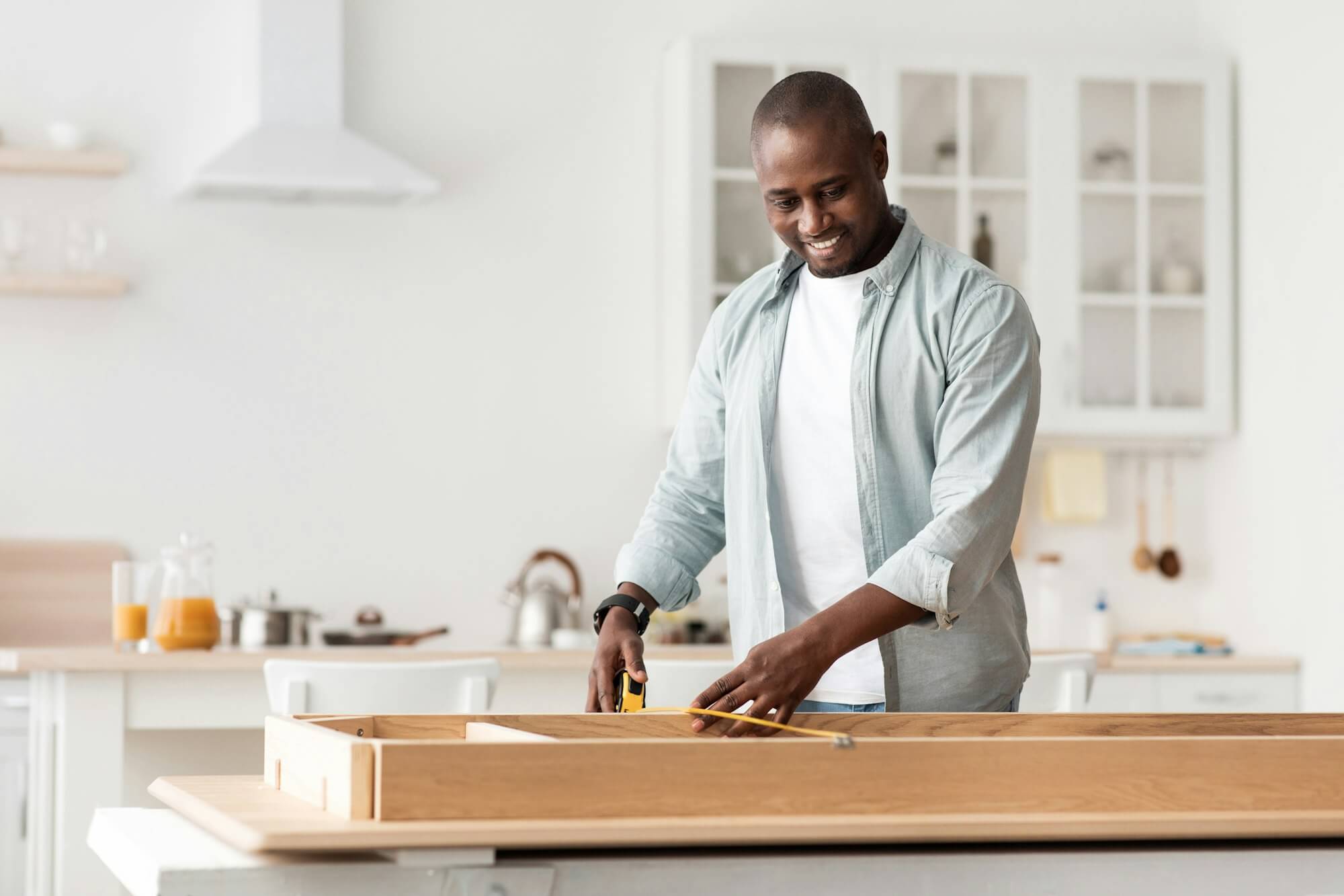 handyman-working-at-home-repairing-assembling-and-renovation-or-new-hobby-man-measuring-new-table.jpg